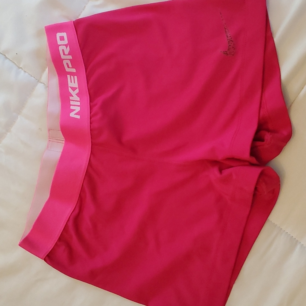 Pink Nike pro compression shorts